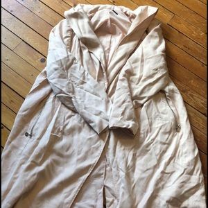 Light pink long jacket. Size is either a 1x or 2x in the plus size section